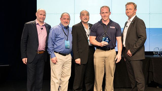 Convergint-Technologies-MIPS-Award-2017_Edited Convergint Technologies male colleague receiving MIPS 2017 award