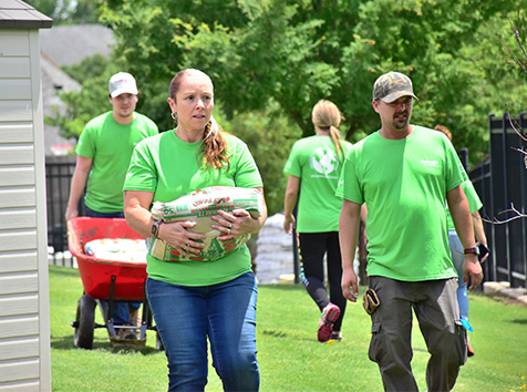 People carrying supplies