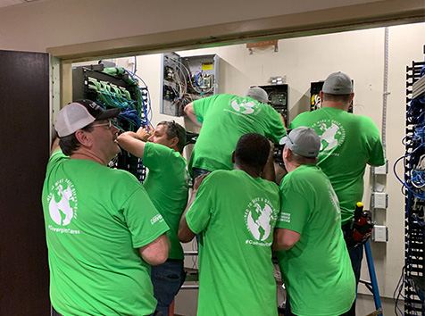 People installing security system