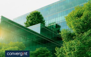A green tinted building with trees